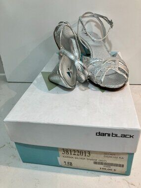 Gorgeous Dani Black Karma sandals in a chic silver snake print leather.